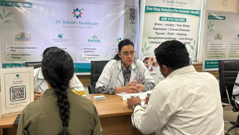 Clinical Psychologist consulting patients at ICSI camp.