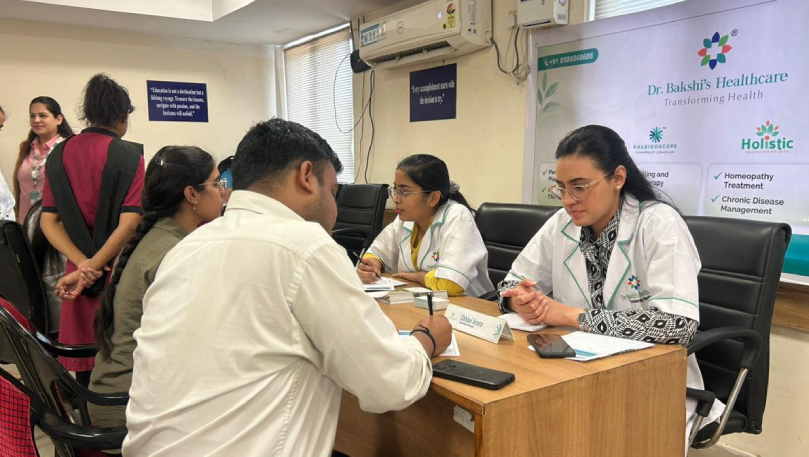 Clinical Psychologist consulting patients at ICSI camp.