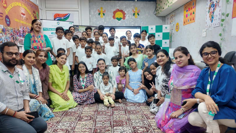 Children and team group photo at wellness workshop.