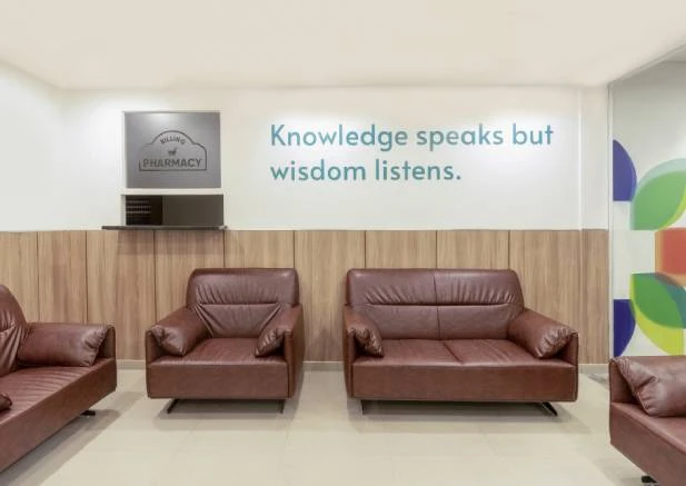 Doctor consulting patient in modern medical clinic setting