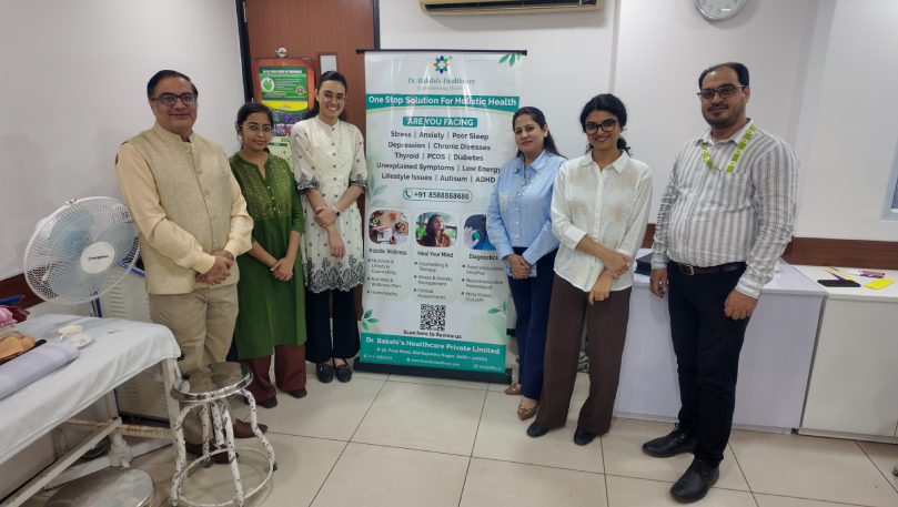 Team posing at Shriram Clinic wellness workshop.