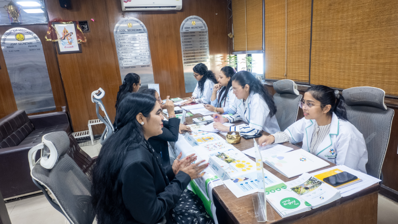 Healthcare team consulting at Dwarka Court camp.
