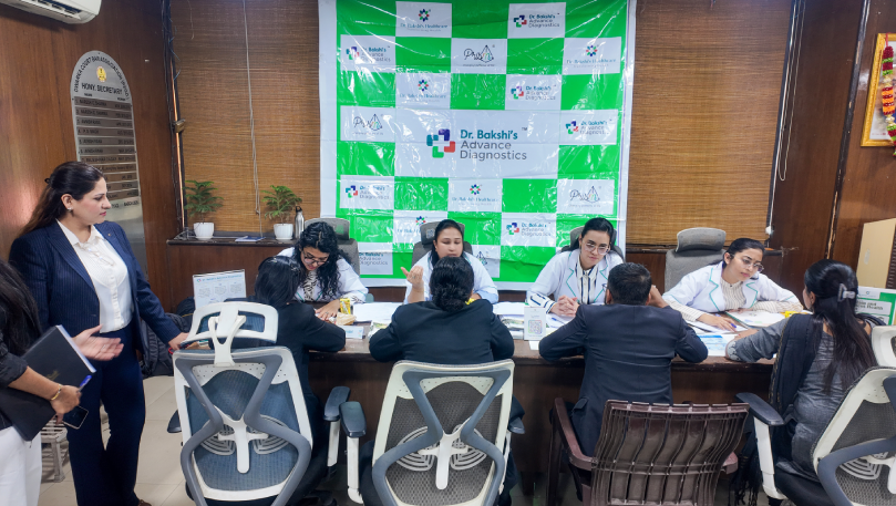 Dr. Bakshi's team consulting at Dwarka Court camp.