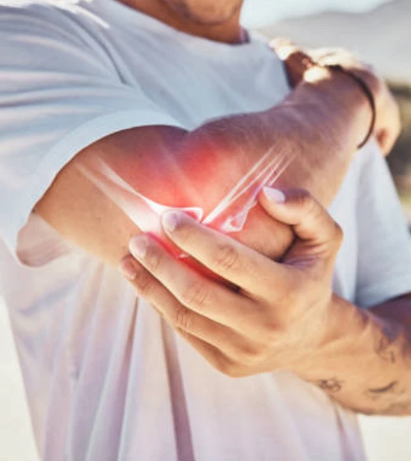 Person holding elbow with highlighted joint pain